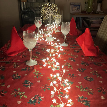 200 LED warm white star lights on Christmas table